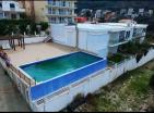 The two-storey townhouse 220 m2 with big pool 25 m from sea
