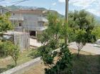 For sale a two-storey house 155 m2 with three bedrooms and garden