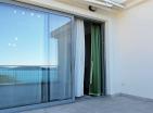 An apartment on Sveti Stefan 110 m2 with a sea view for sale