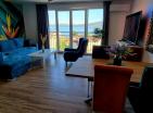 Three-room apartment 64 m in Baosici, Herceg Novi in new complex with parking