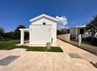 Two new houses in Uteha with sea view next to the beach