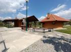 Big green demesne with 3 building in Danilovrad