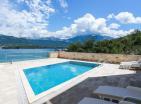 Modern villa next to Tivat with private beach, boat dock and panoramic views