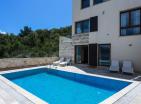 Modern villa next to Tivat with private beach, boat dock and panoramic views