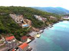 Modern villa next to Tivat with private beach, boat dock and panoramic views