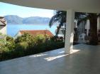 Scenic 3-story home in Krasici with sea view and palm