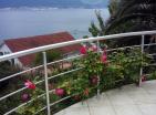 Scenic 3-story home in Krasici with sea view and palm