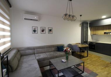 Charming 1-bedroom apartment in Podgorica City Kej with terrace and garage