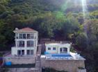 Exclusive beachfront villa in Kostanjica with 4 aparts: mini hotel with a beach