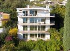 Luxurious three bedrooms 107 m2 flat in Đenovići with panoramic bay views