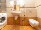 Luxurious three bedrooms 107 m2 flat in Đenovići with panoramic bay views