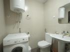 2 rooms flat 54m2 in Budva next to the sea with underground parking